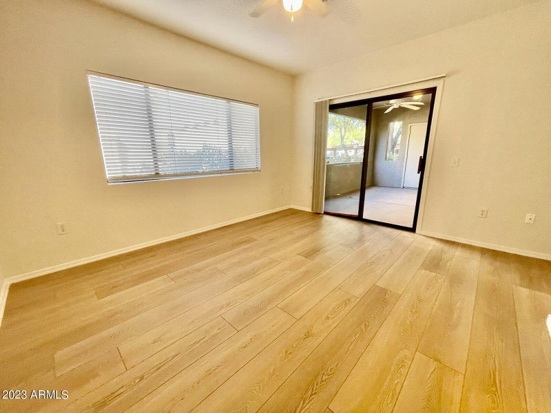 MASTER BD W ACCESS OUT TO PRIVATE PATIO