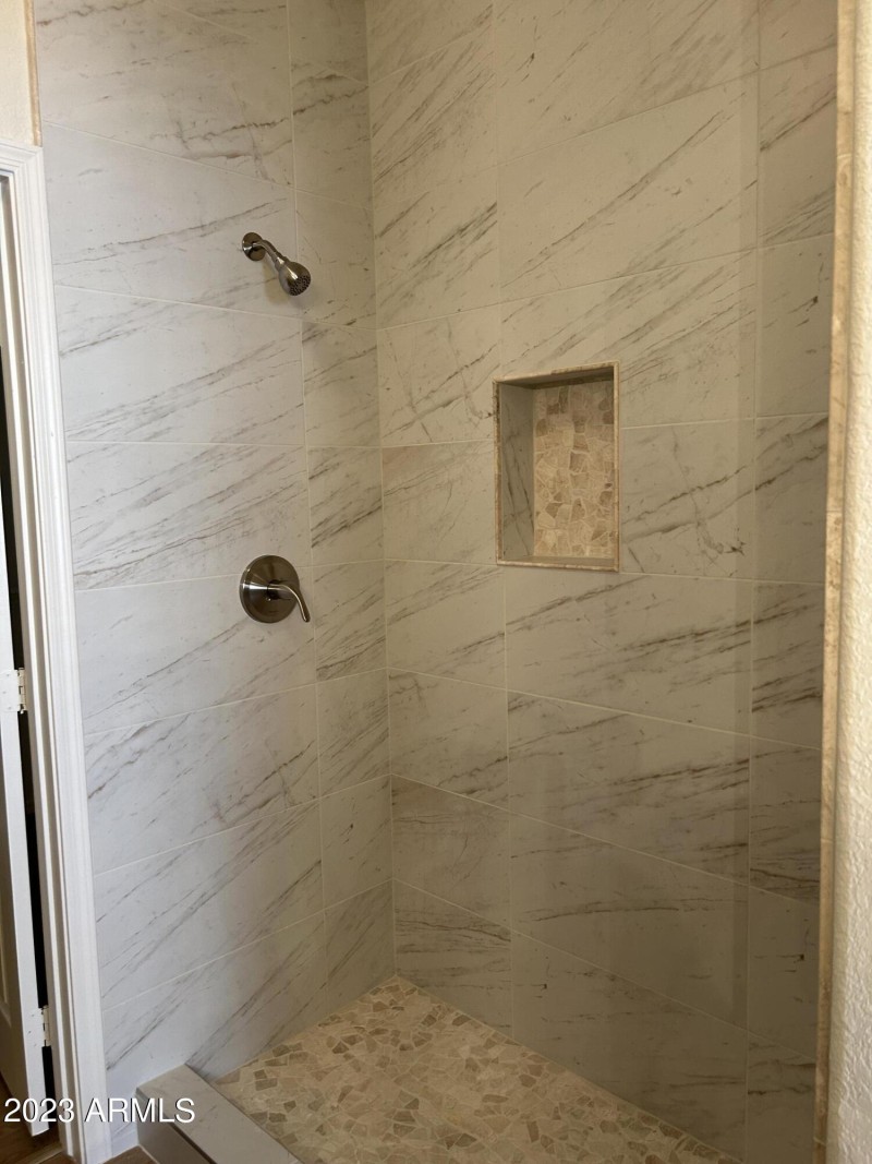 NEW PORCELAIN SURROUND IN SHOWER