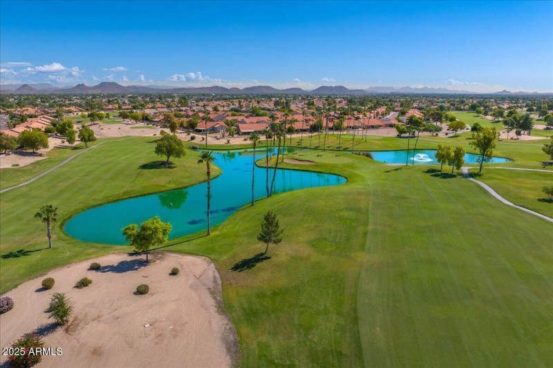 Long views of side-by-side fairways