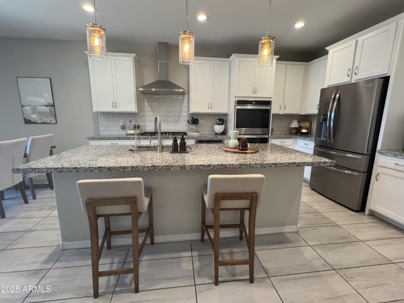 Bright Kitchen with Bar Seating
