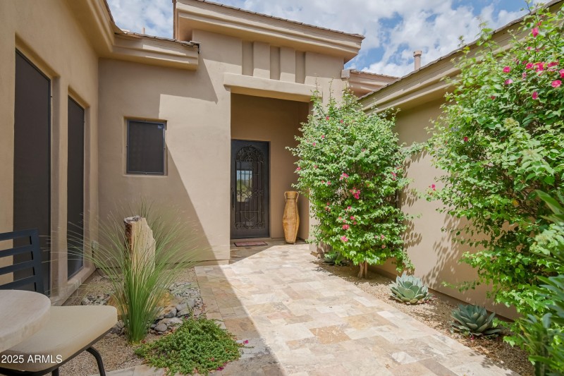 Travertine Pavers & Iron Entry Door