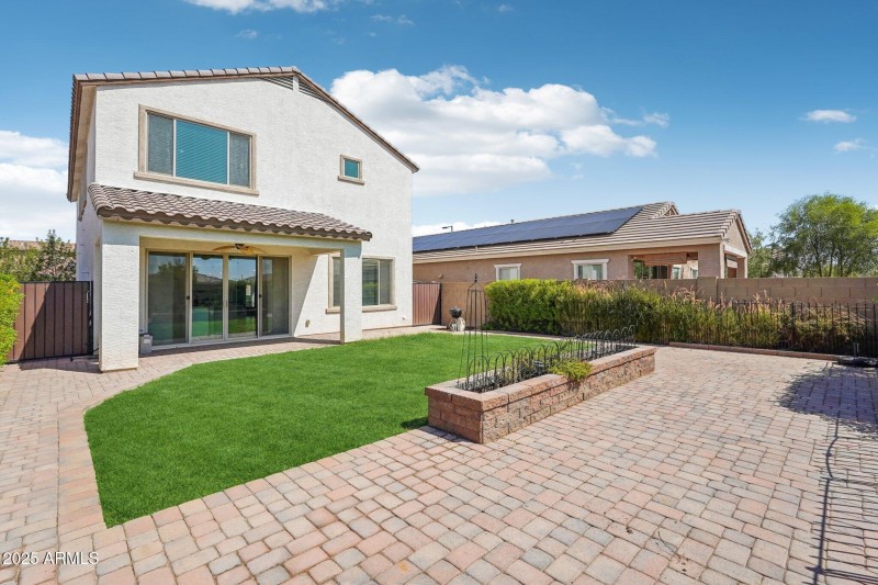 Backyard Oasis lined with pavers