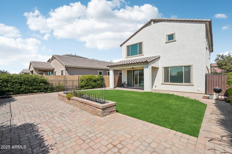 Backyard Oasis lined with pavers