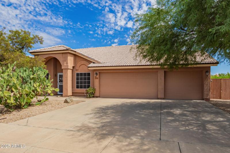 3-car garage and oversized driveway