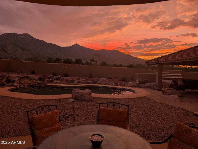 sunset over the pool