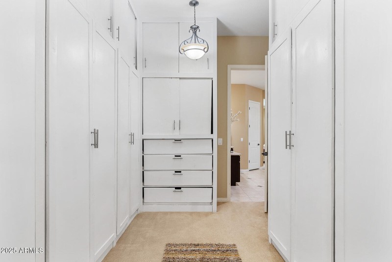 Primary Suite Walk-In Closet