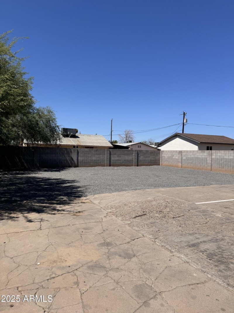 Gravel area behind parking