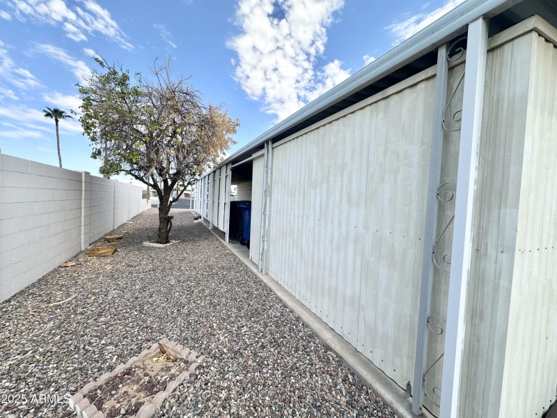 SIDE AREA ADJACENT TO CARPORT