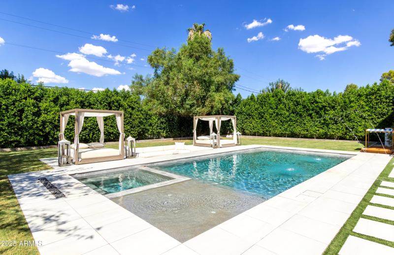 pool, hot tub, baja seating in pool