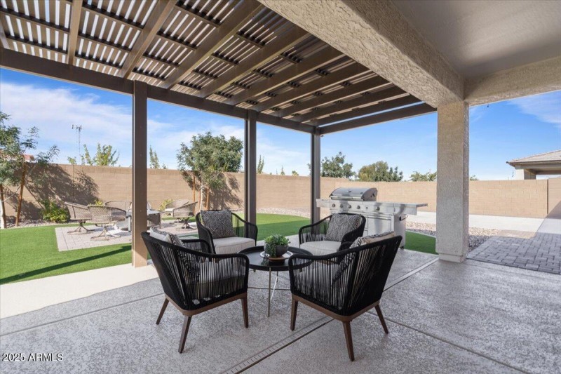 Extended patio with a Pergola