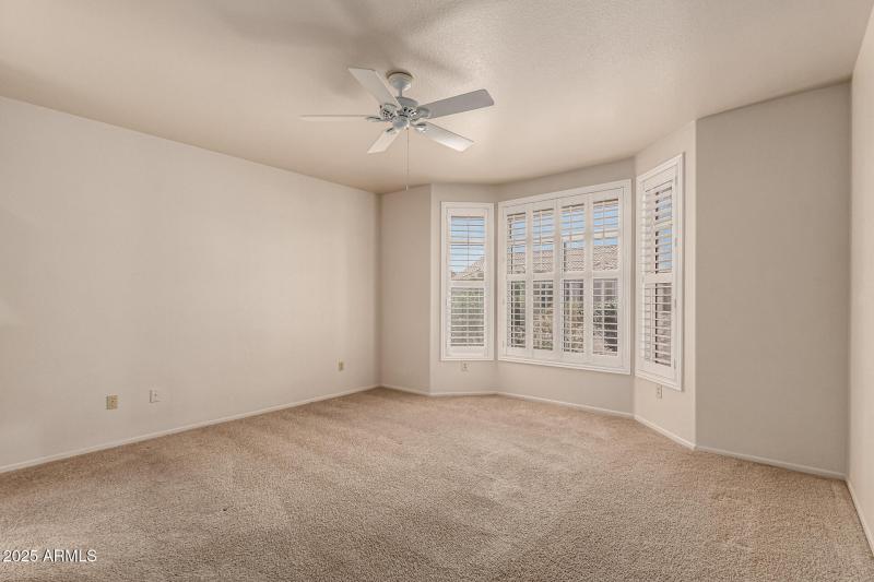 Primary bedroom with bay window