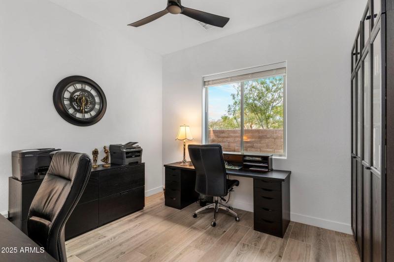 bedroom/office with closet