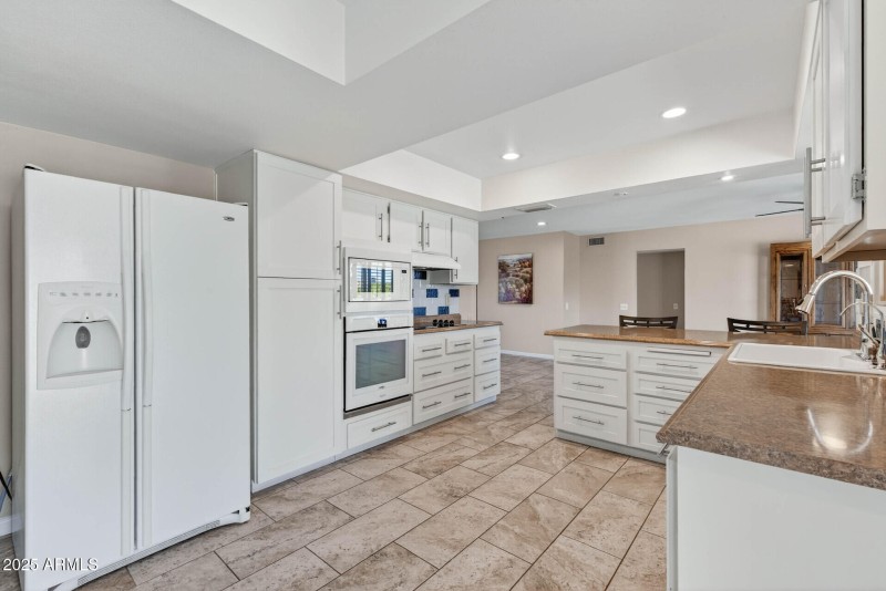 Kitchen towards Dining and Hall