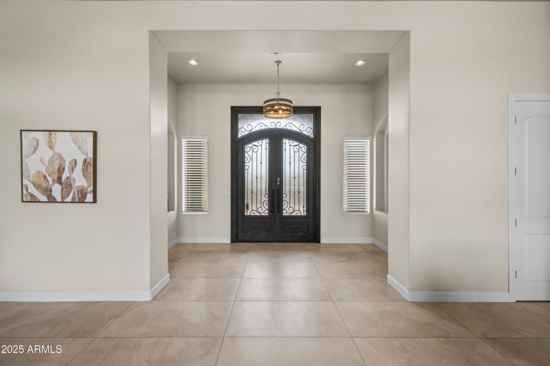 Beautiful Iron Doors at Front Entry
