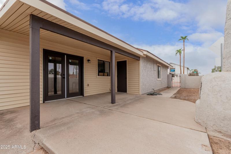 BY COVERED PATIO