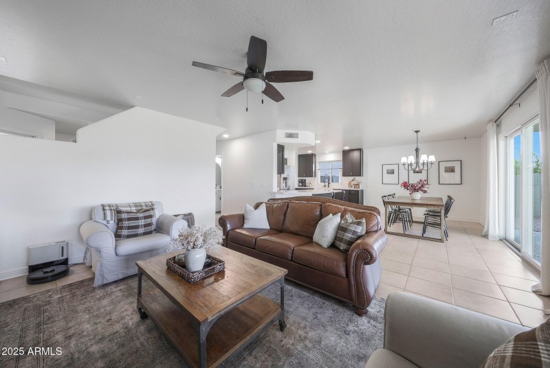 Living area facing dining/kitchen