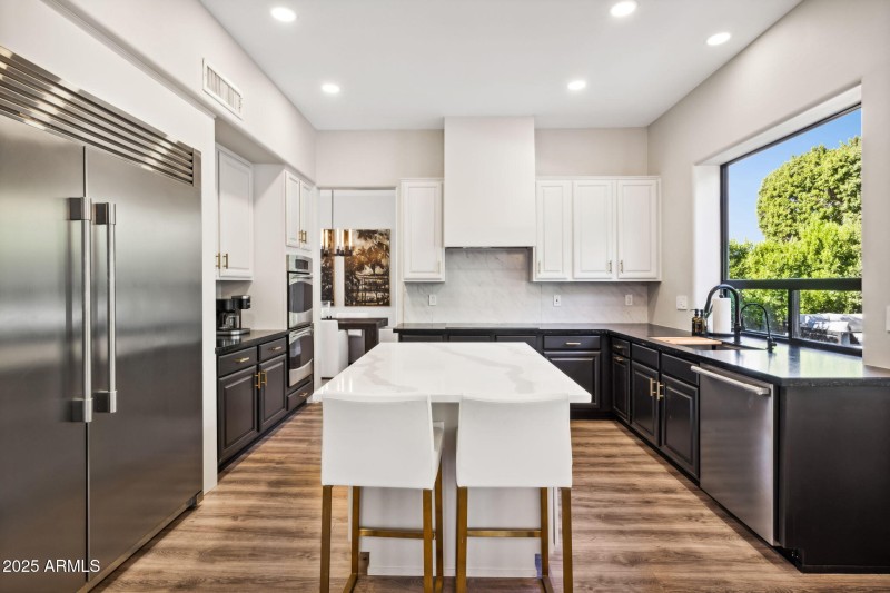 20-web-or-mls-6414-e-monte-cristo-ave