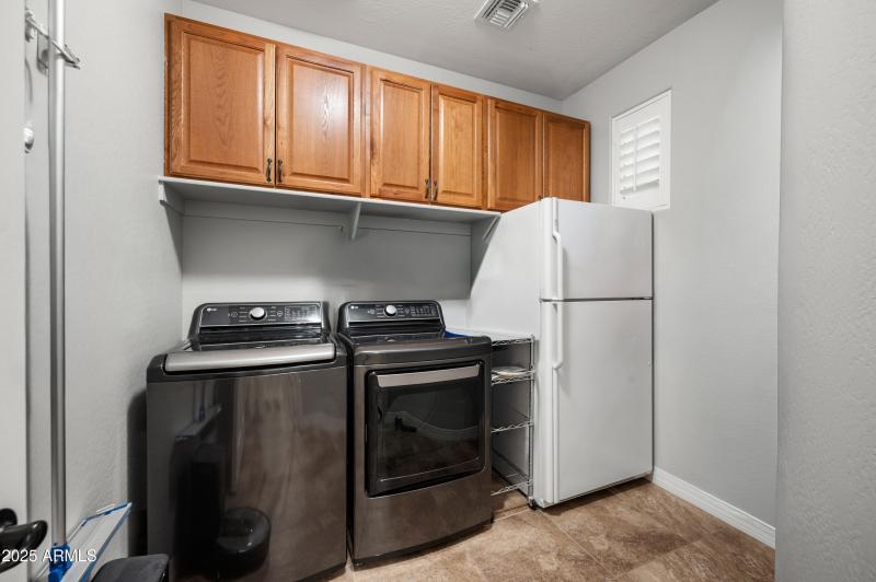 Laundry Storage & room for extra fridge