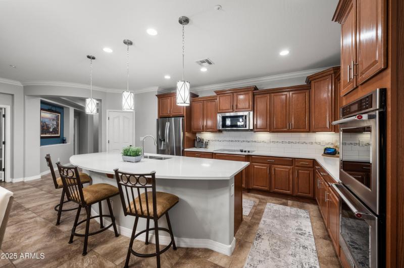 Chef's kitchen features double oven