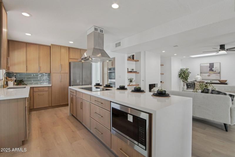 Custom cabinets and waterfall countertop