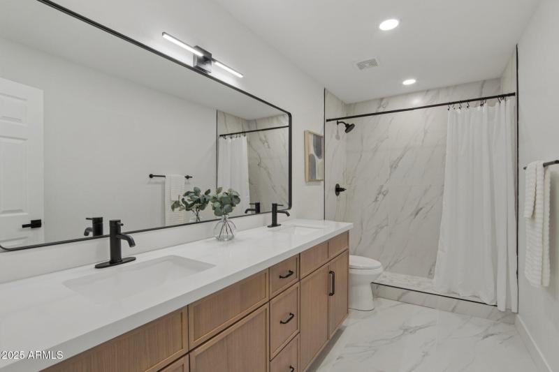 2nd story bathroom with dual sinks