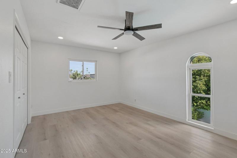 2nd Story Guest Bedroom facing backyard
