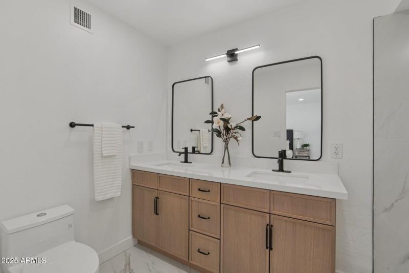 Primary bathroom dual sinks