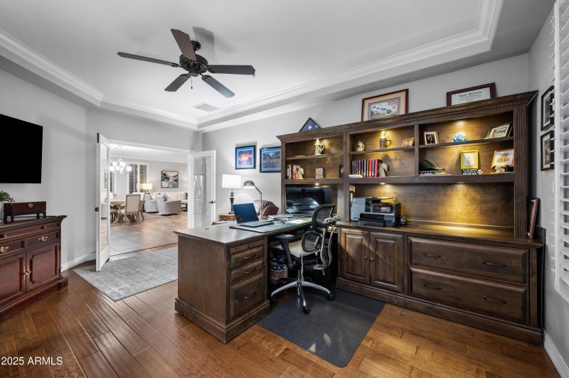 Built in lighted bookcase & desk to