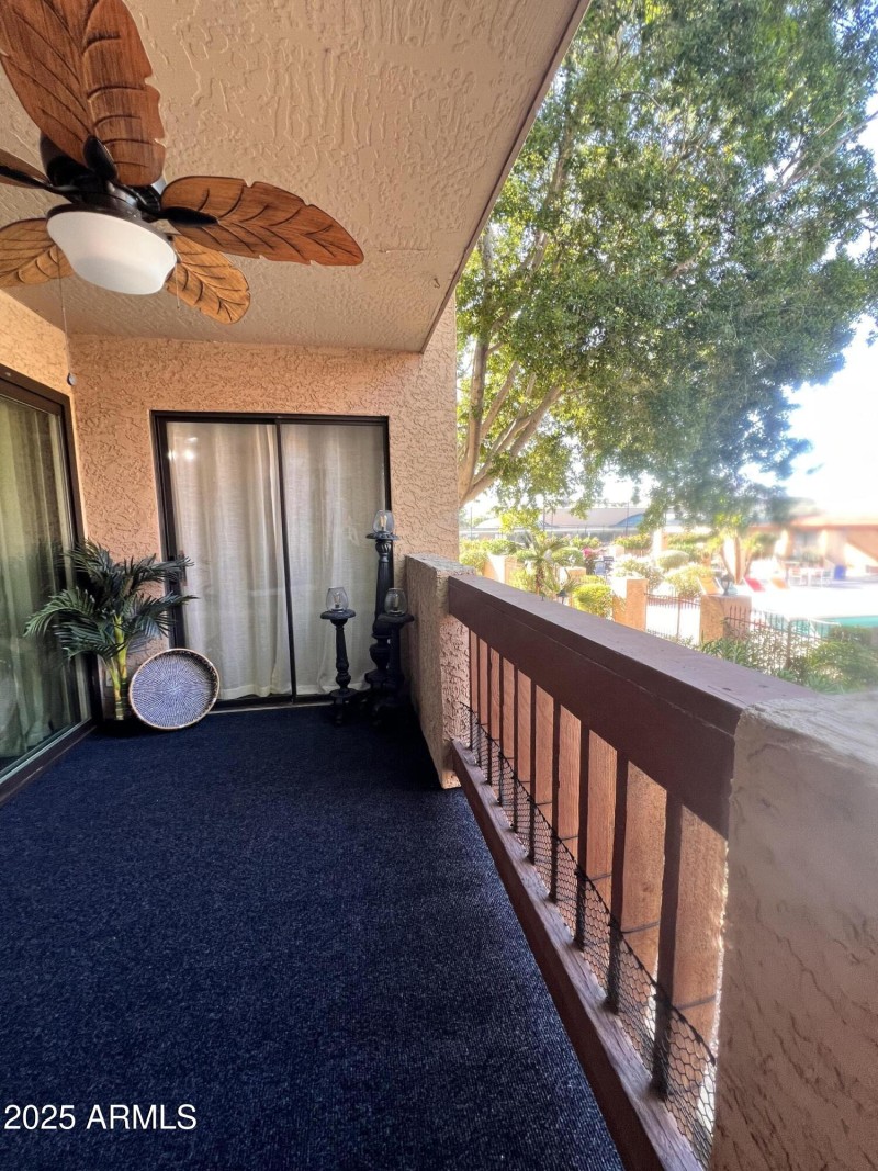 BALCONY OVERLOOKS POOL TOO!