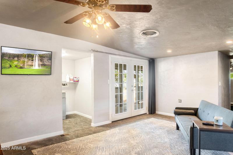 Living room leading to patio
