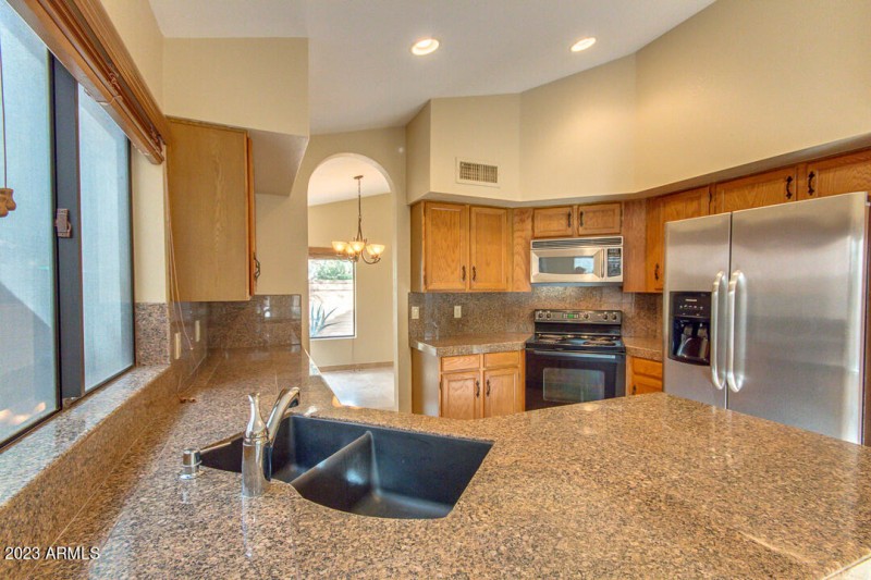 7 CUSTOM GRANITE COUNTERTOPS AND STAINLE