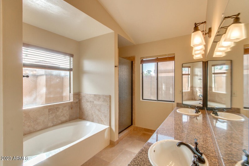 16. MASTER BATHROOM WITH TUB AND SHOWER