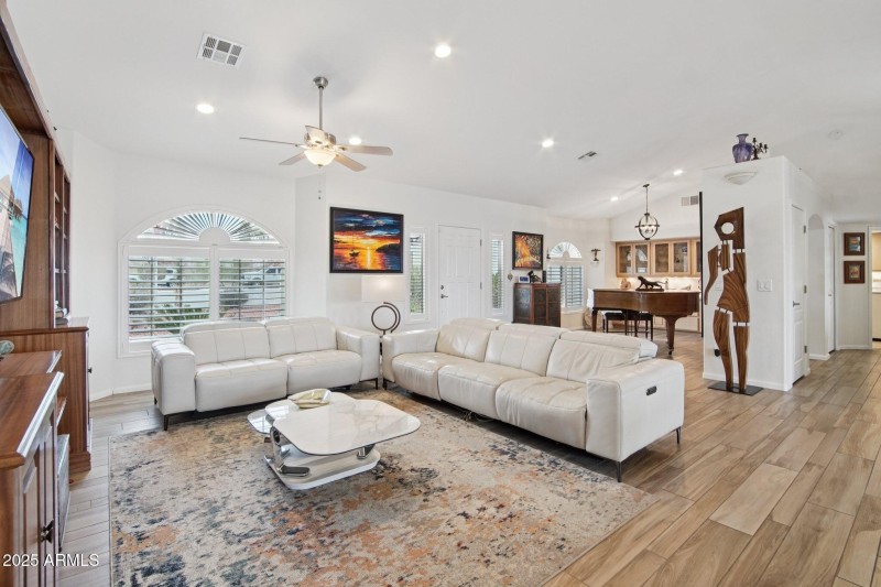 Living room with wood plank tile floors