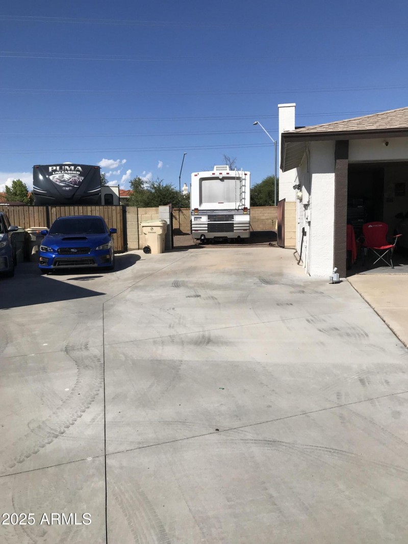 RV driveway into backyard