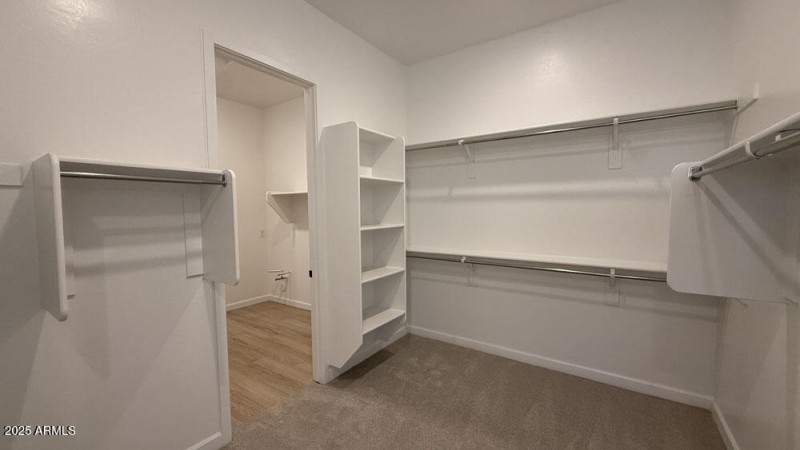025 - Owner's Walk In Closet
