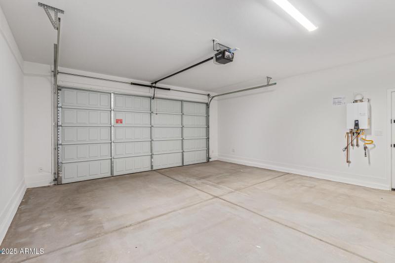 Garage with 8' Garage Door and Tankless