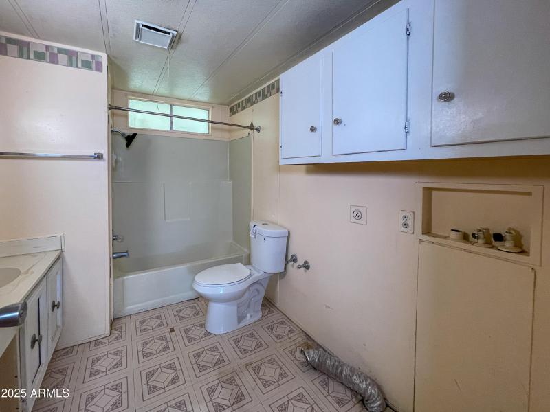 Guest bathroom and laundry combo (2)