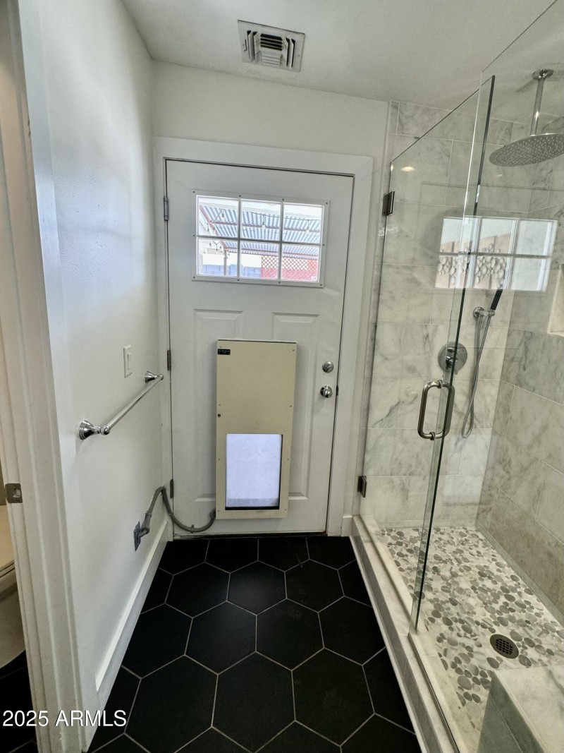 Master bathroom doggie door
