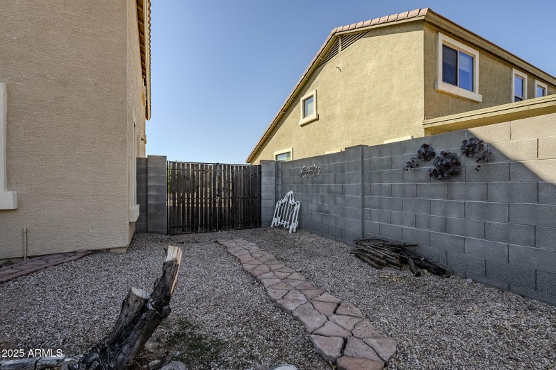 View of double gate from backyard