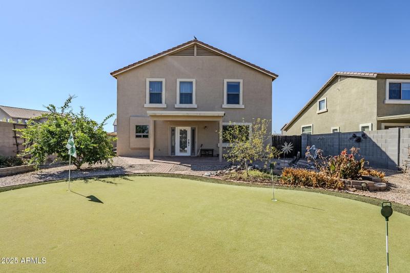 Large backyard with putting green