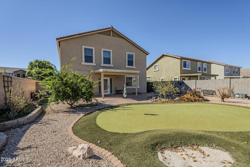 Large backyard with putting green