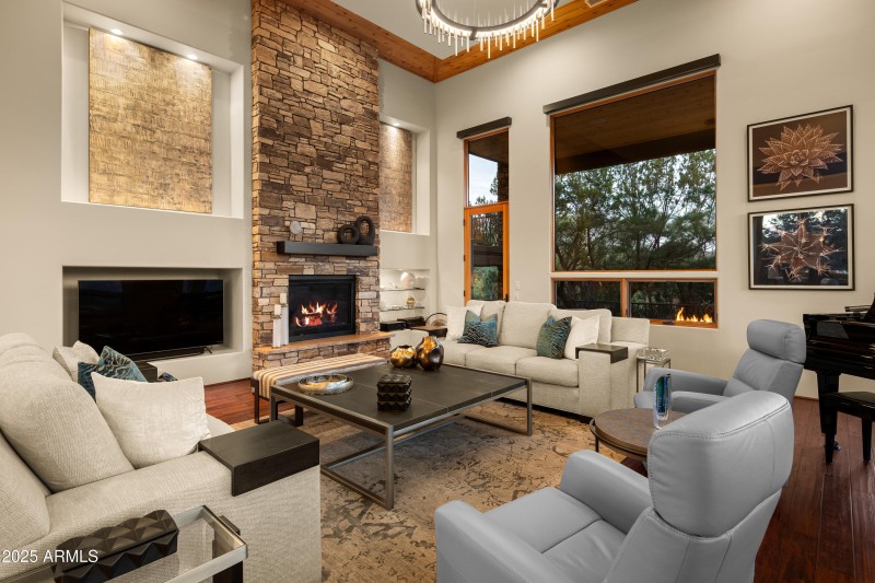 REMODELED GREAT ROOM WITH STONE FIREPLAC