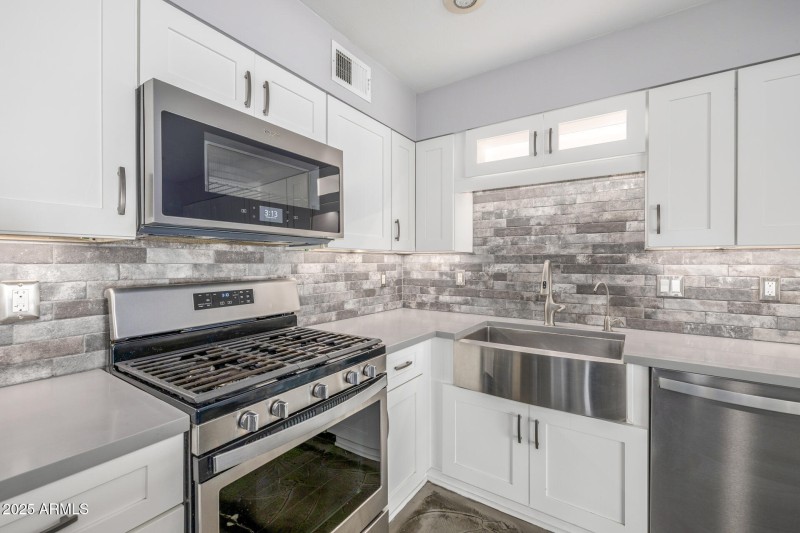 Kitchen with stainless steel appliances