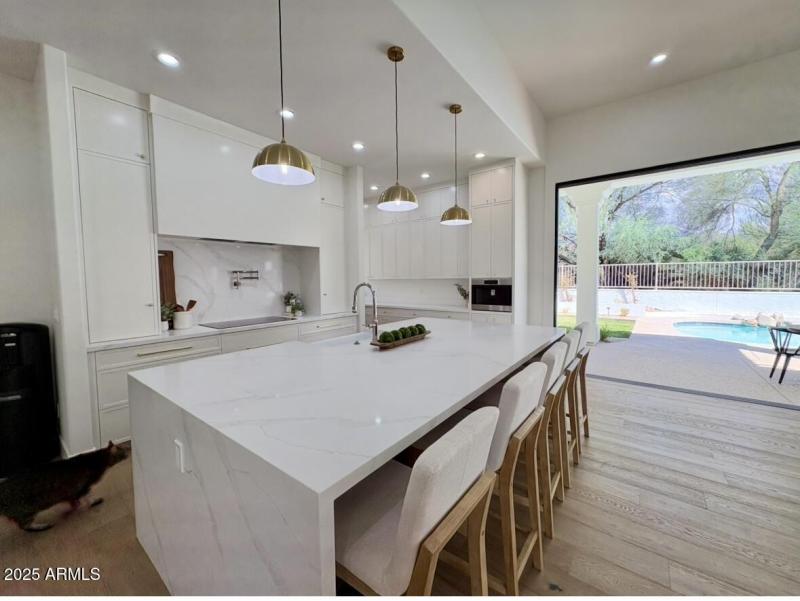 Flanked by Glass Sliders thruout