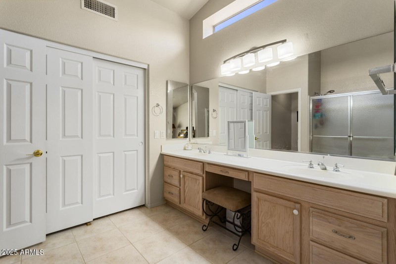 Dual sink vanity walk-in closet