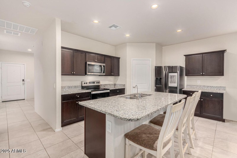 chef's kitchen with island