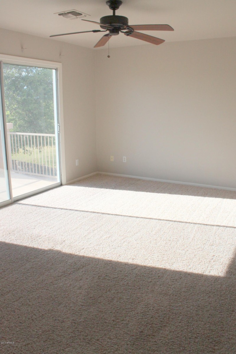 Master bedroom out to balcony