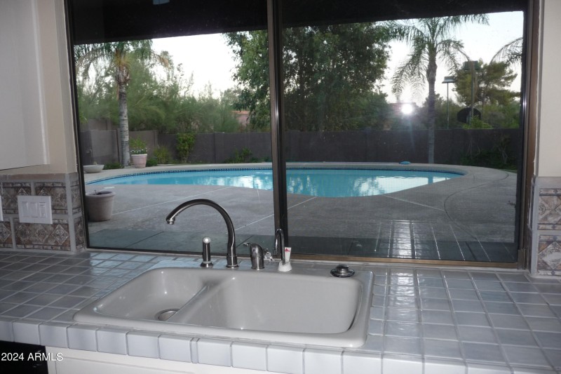 Kitchen overlooks pool