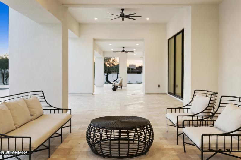 SEATING AREA UNDER COVERED PATIO