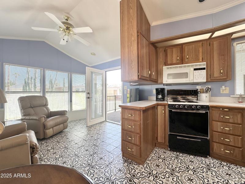 VIEW OF FRONT LIVING SPACE OFF KITCHEN